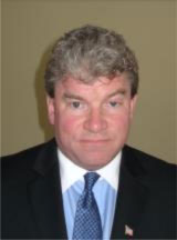 Tom Poirier Background